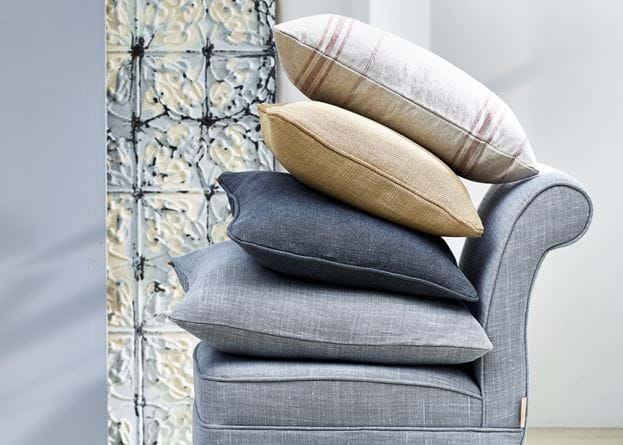 Grace scatter cushion stack on Madeleine chair