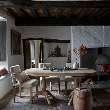 Henley extending near fireplace with vase