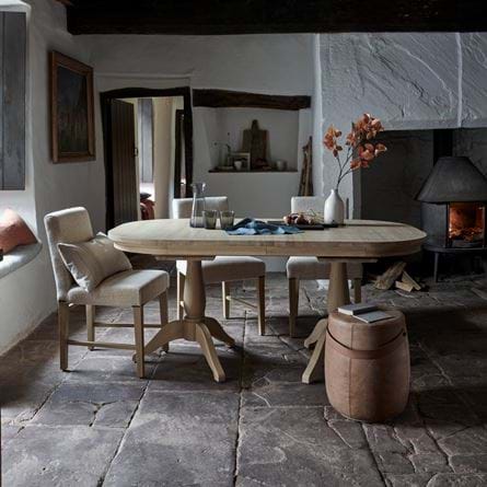 Henley extending near fireplace with vase