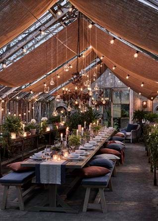 Greenhouse Gathering at Dusk Garden Lighting