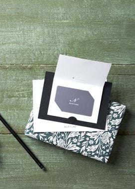 Gift Card and Pine Branch with Present Open