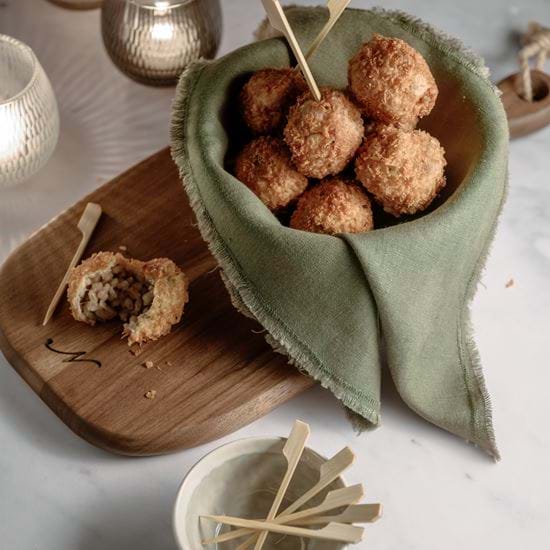 Neptune food, pearl barley and truffle arrancini